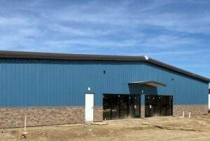 A veterinary office and doggy daycare in a steel building.