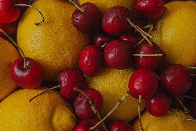 Colorful fruits and vegetables like oranges, sweet potatoes, and avocados rich in hair-supporting vitamins