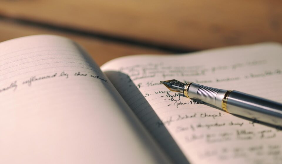 wellness journal with pen